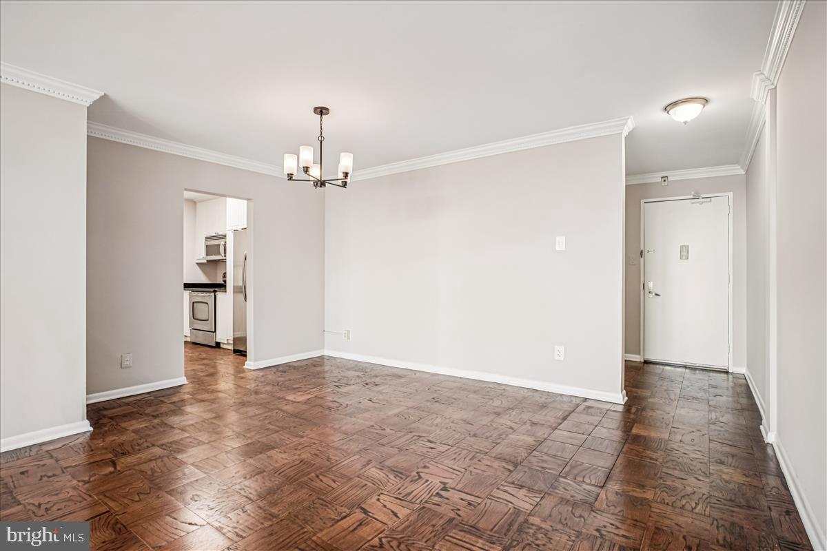 5101 River Road, Unit 1712 Bethesda, MD 20816 - Photo 8 of 25 Dining room to kitchen and entrance.
