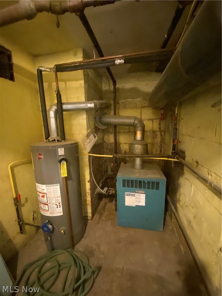 193 Merriman Road Akron, OH 44303 - Photo 30 of 30 Boiler and hot water tank.