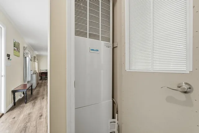 a view of a room that has a window in it