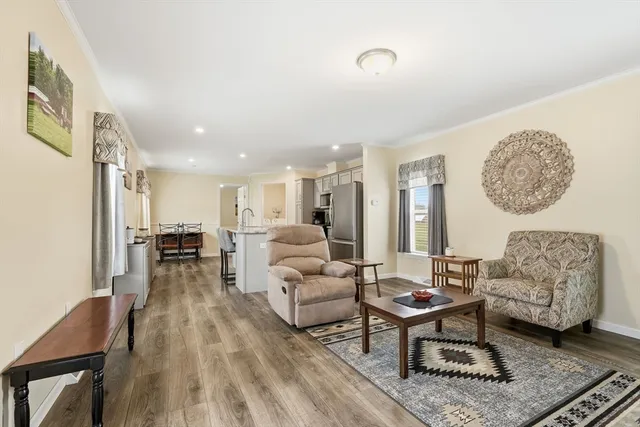 a living room with furniture and a table