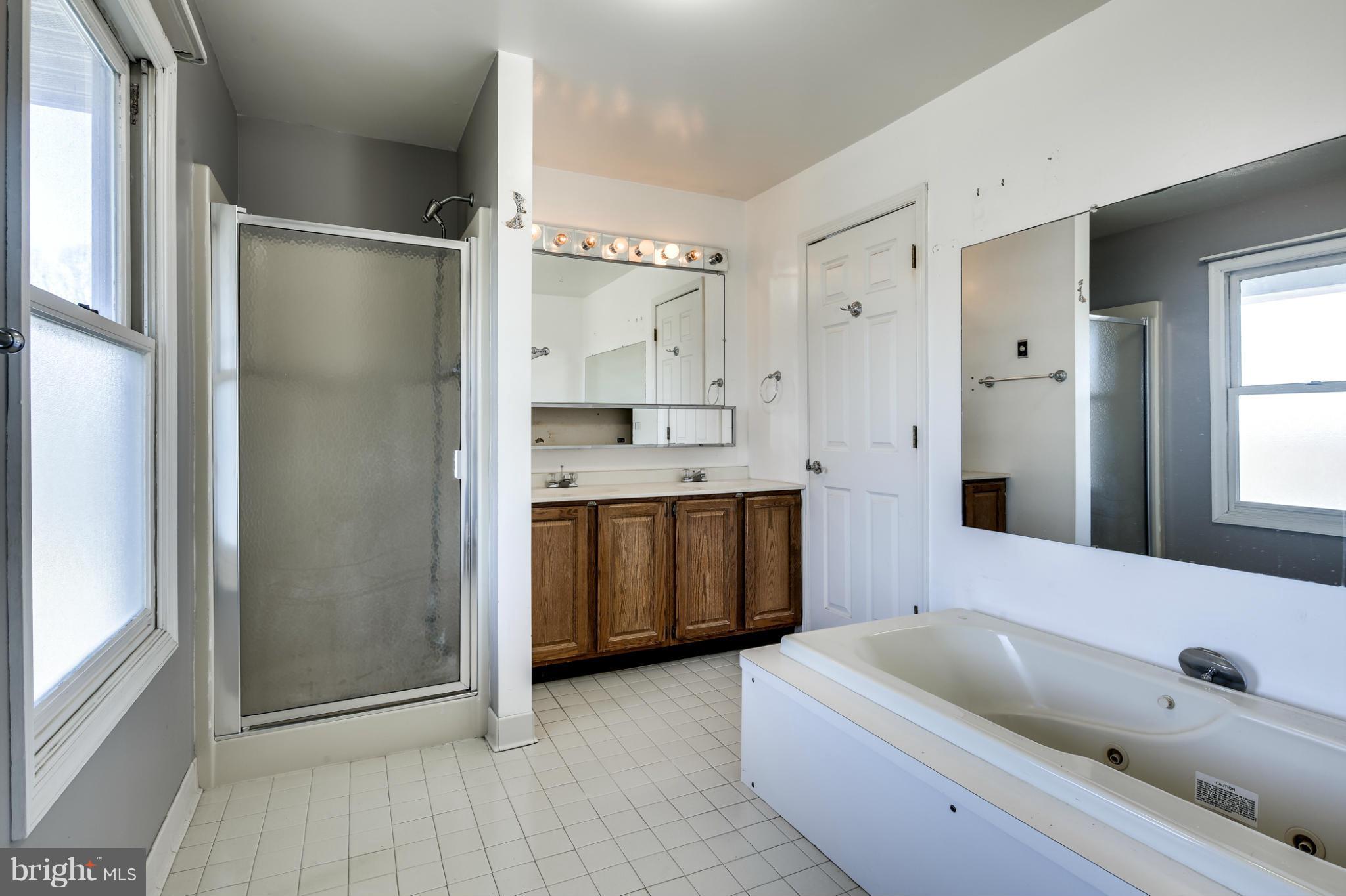 7343 Pindell School Road Fulton, MD 20759 - Photo 21 of 29 Bath (Master) Sep Shower Sep Tub