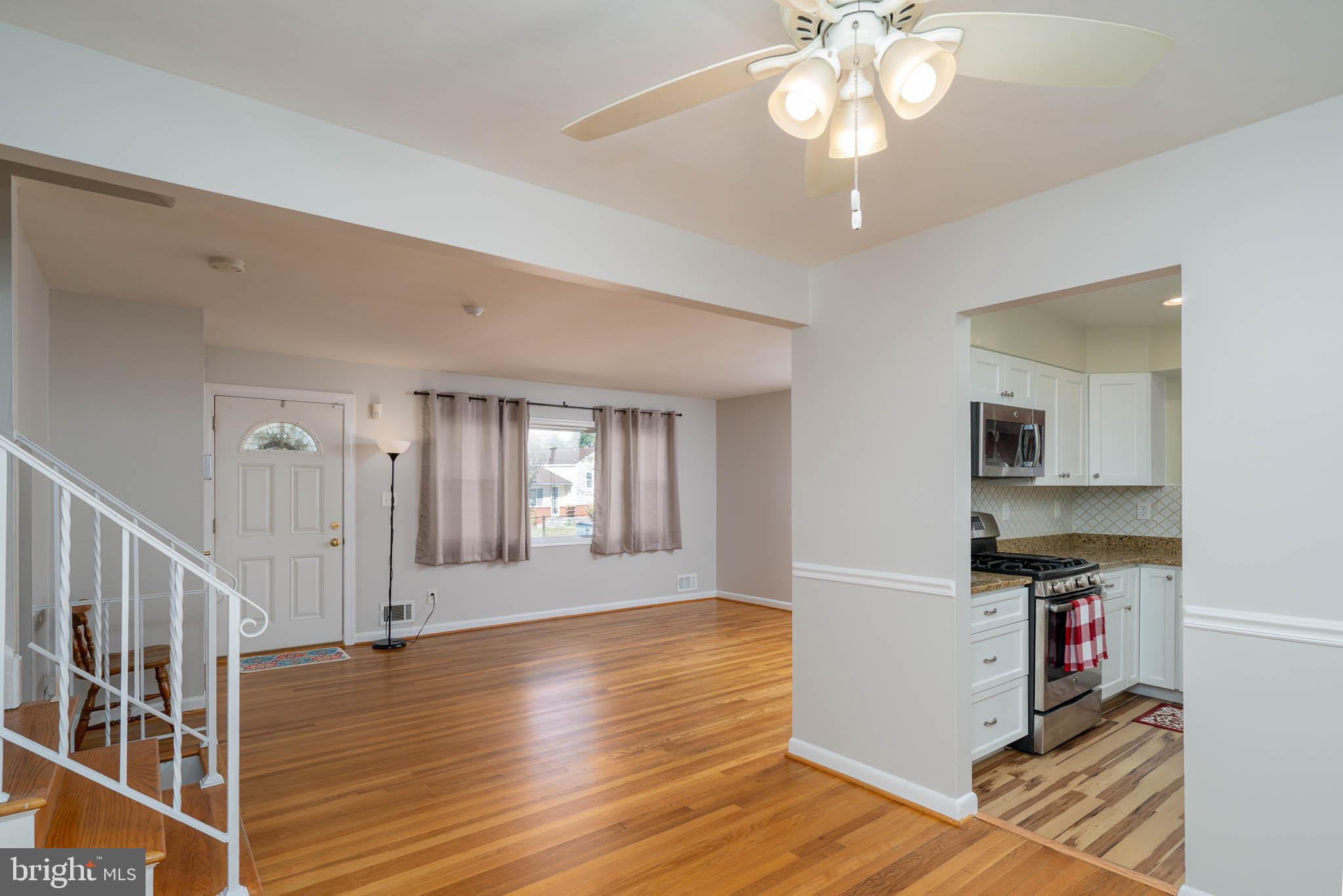 6815 Decatur Street Hyattsville, MD 20784 - Photo 8 of 24 Dining Room to Living Room and Kitchen