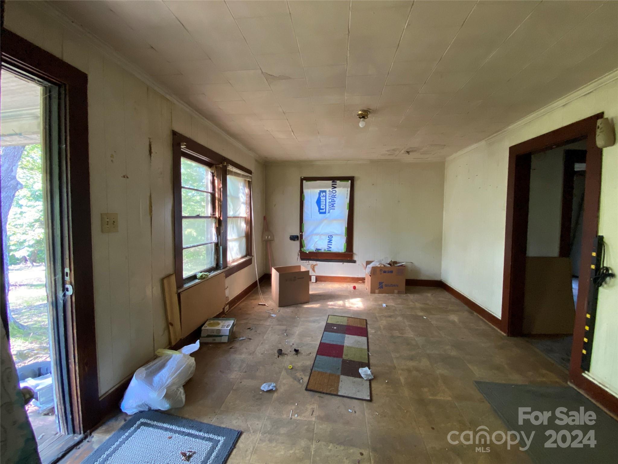 3140 Rutherford College Road Valdese, NC 28690 - Photo 14 of 40 a living room with furniture and a window
