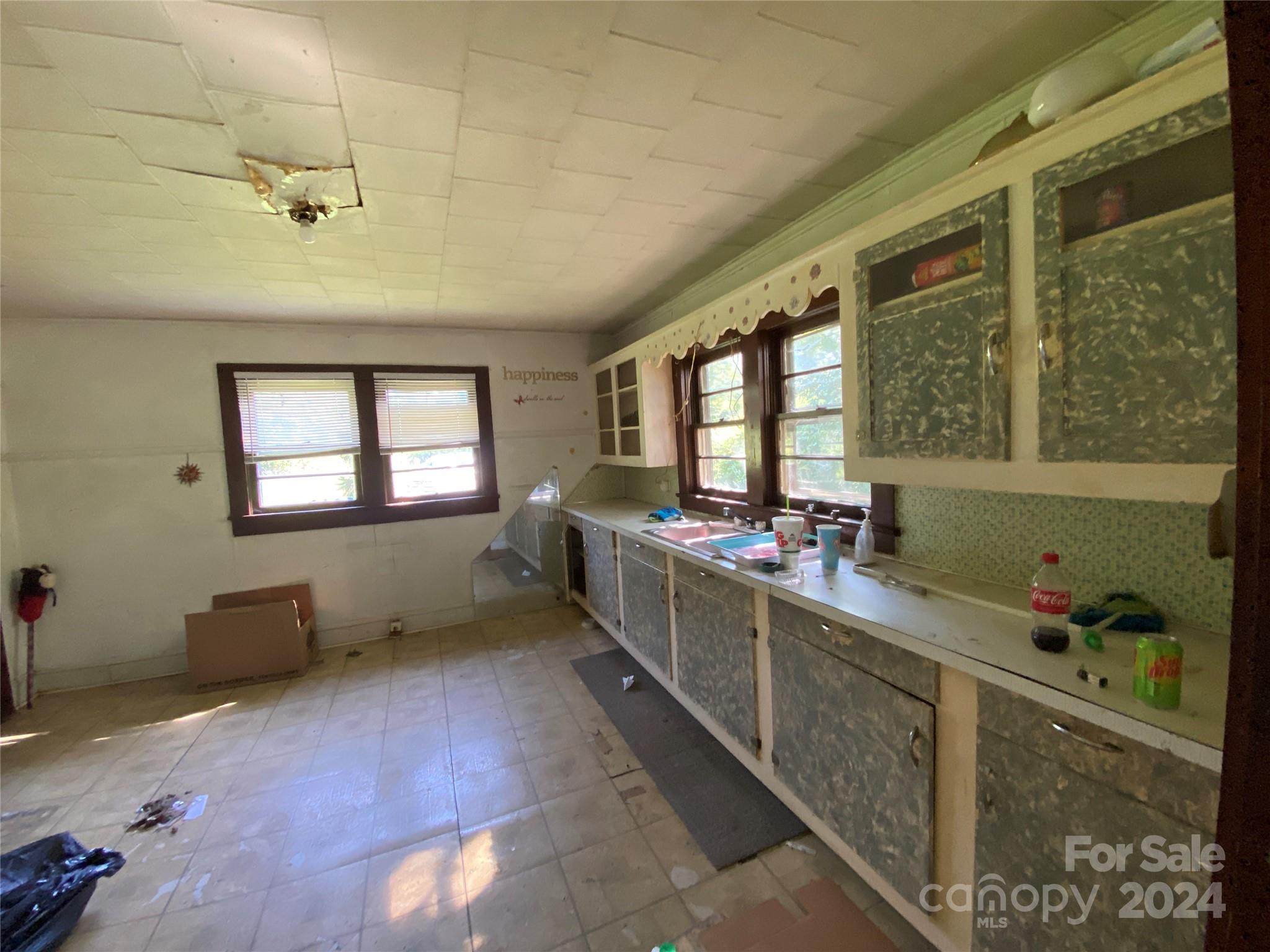 3140 Rutherford College Road Valdese, NC 28690 - Photo 15 of 40 a kitchen with sink a window and counter space