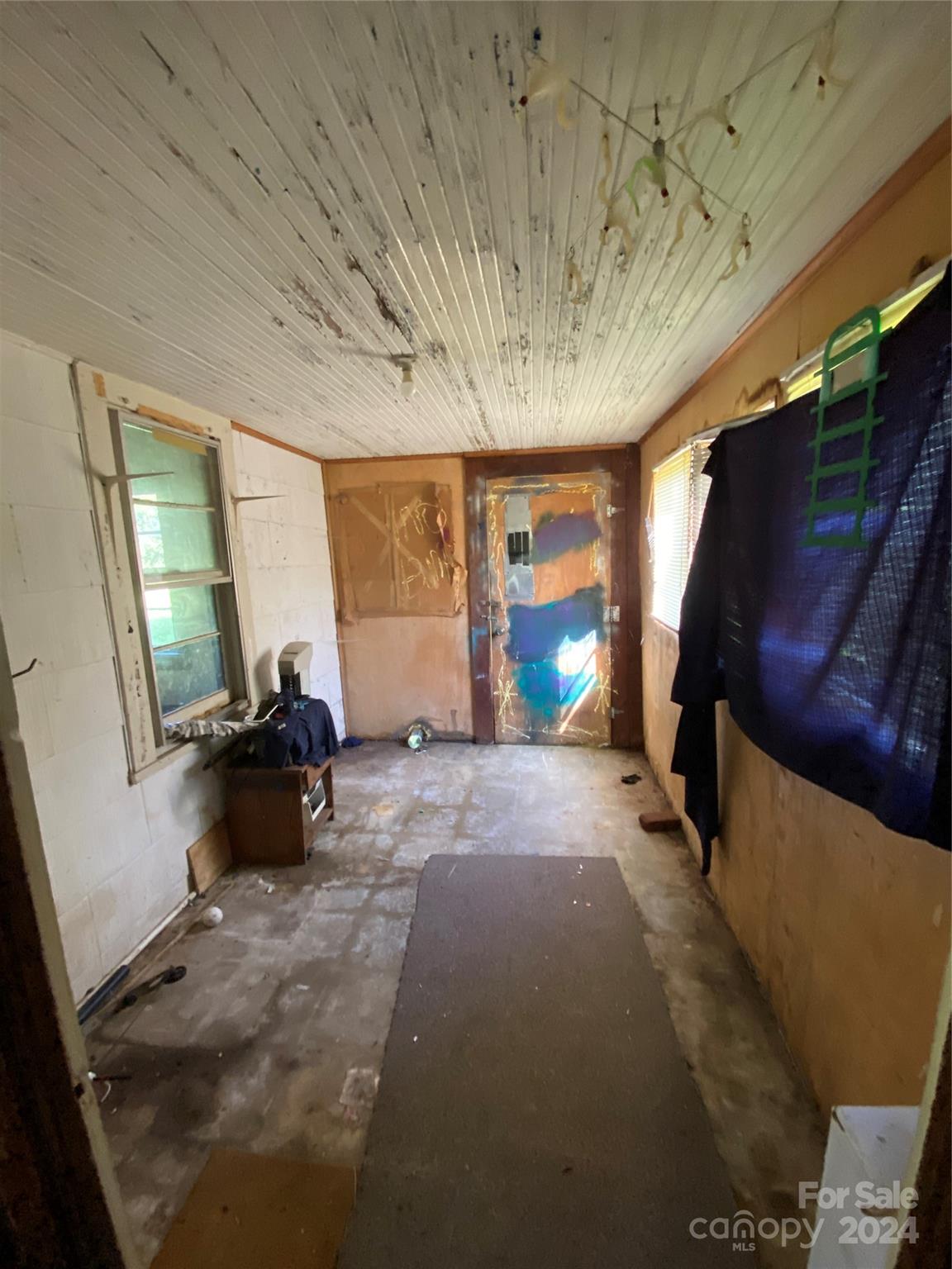3140 Rutherford College Road Valdese, NC 28690 - Photo 18 of 40 a view of a livingroom with furniture and a window