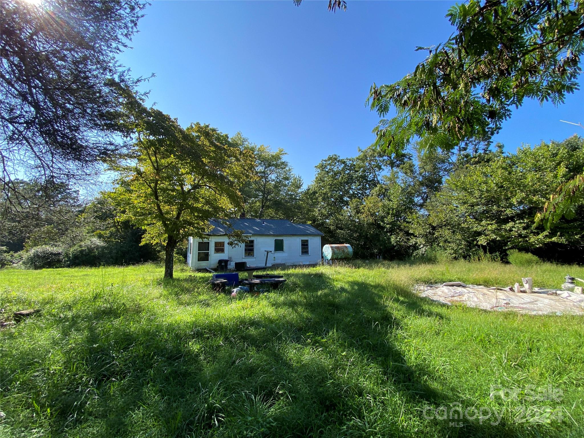 3140 Rutherford College Road Valdese, NC 28690 - Photo 2 of 40 a view of a house with a big yard