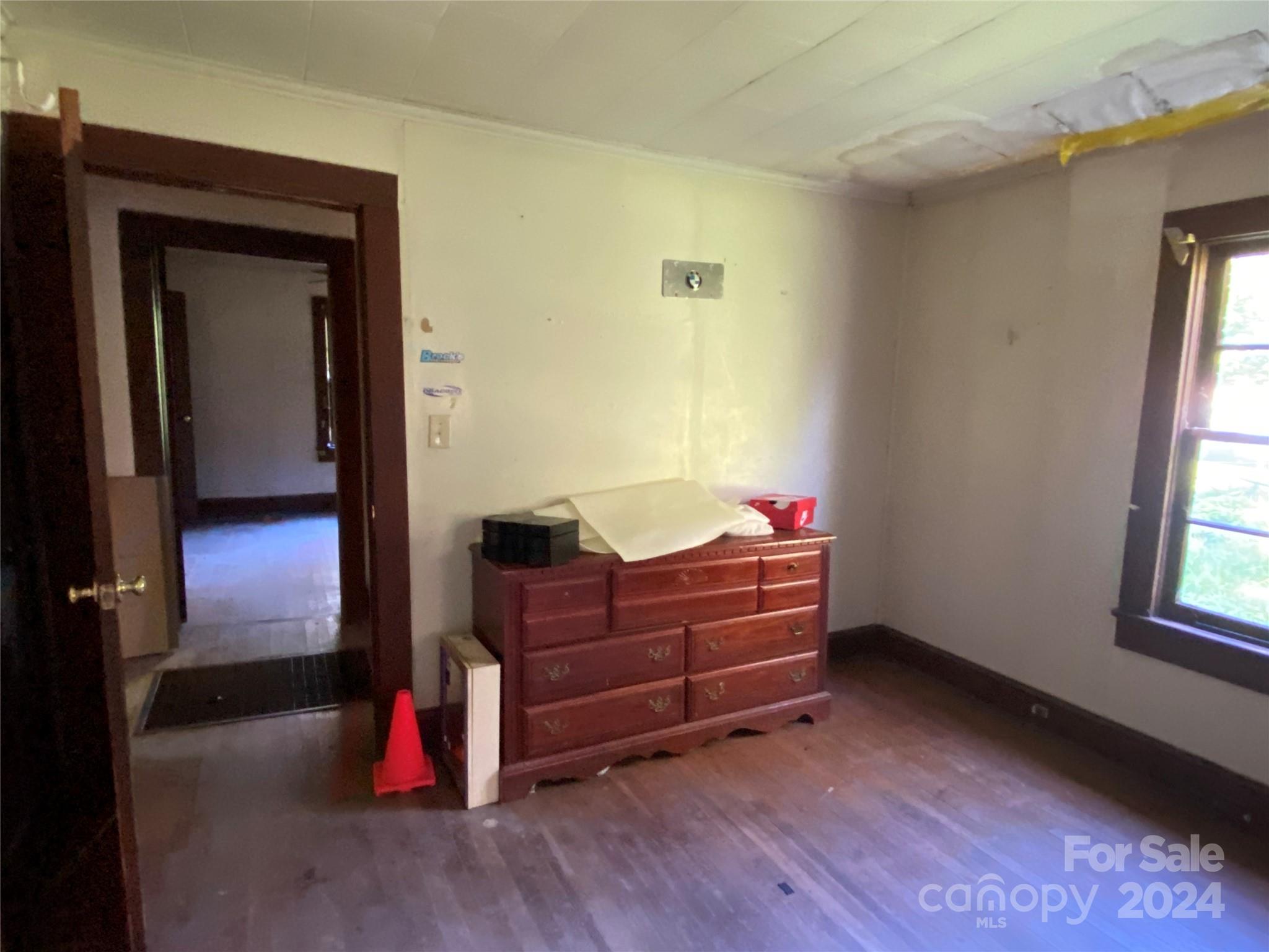 3140 Rutherford College Road Valdese, NC 28690 - Photo 21 of 40 a room with a bed and a window