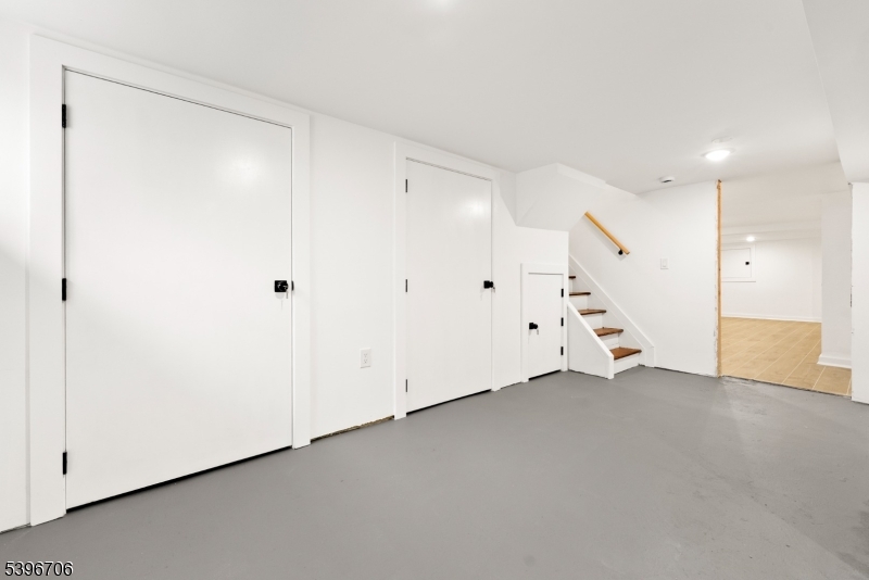 218 Ampere Parkway, Unit 2 Bloomfield, NJ 07003 - Photo 13 of 19 an empty room with a window and a ceiling fan