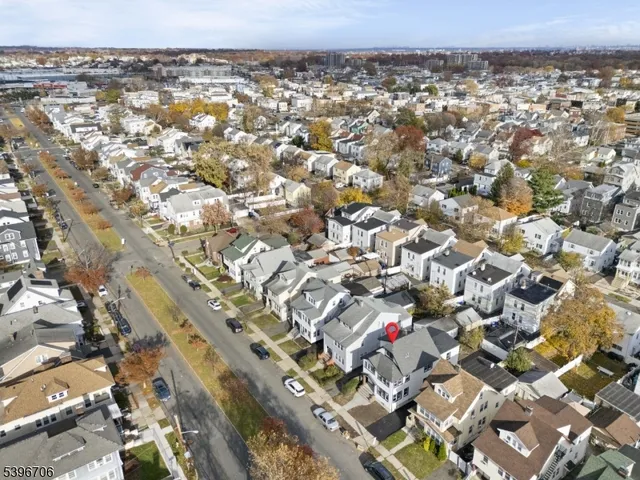 an aerial view of residential building with parking space