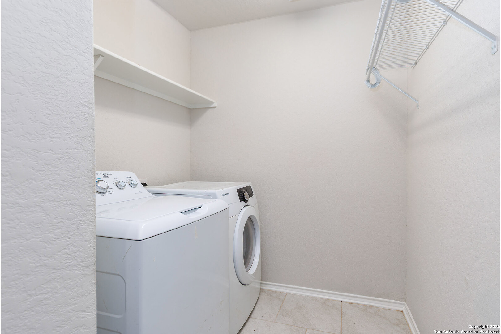 29714 Spring Copper Bulverde, TX 78163 - Photo 19 of 26 a utility room with dryer and washer