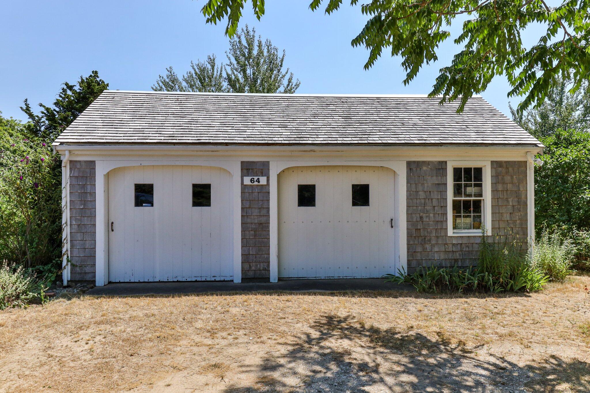 64 Depot Road Truro, MA 02666 - Photo 11 of 53 a house with a tree in front of it