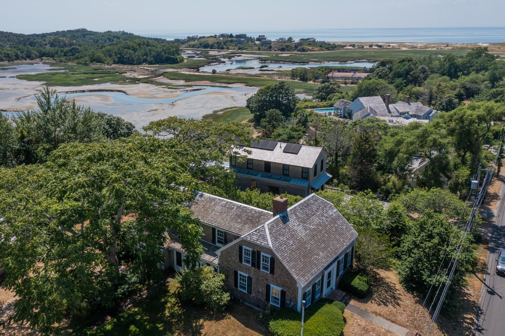 64 Depot Road Truro, MA 02666 - Photo 12 of 53 an aerial view of a house with outdoor space and lake view