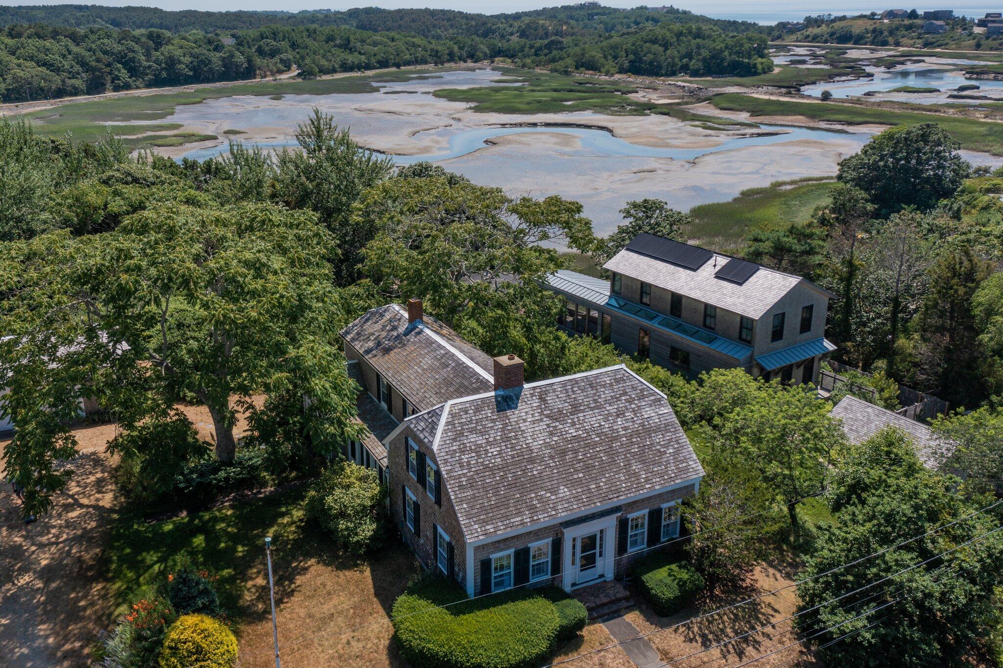 64 Depot Road Truro, MA 02666 - Photo 13 of 53 an aerial view of a house with a garden and lake view