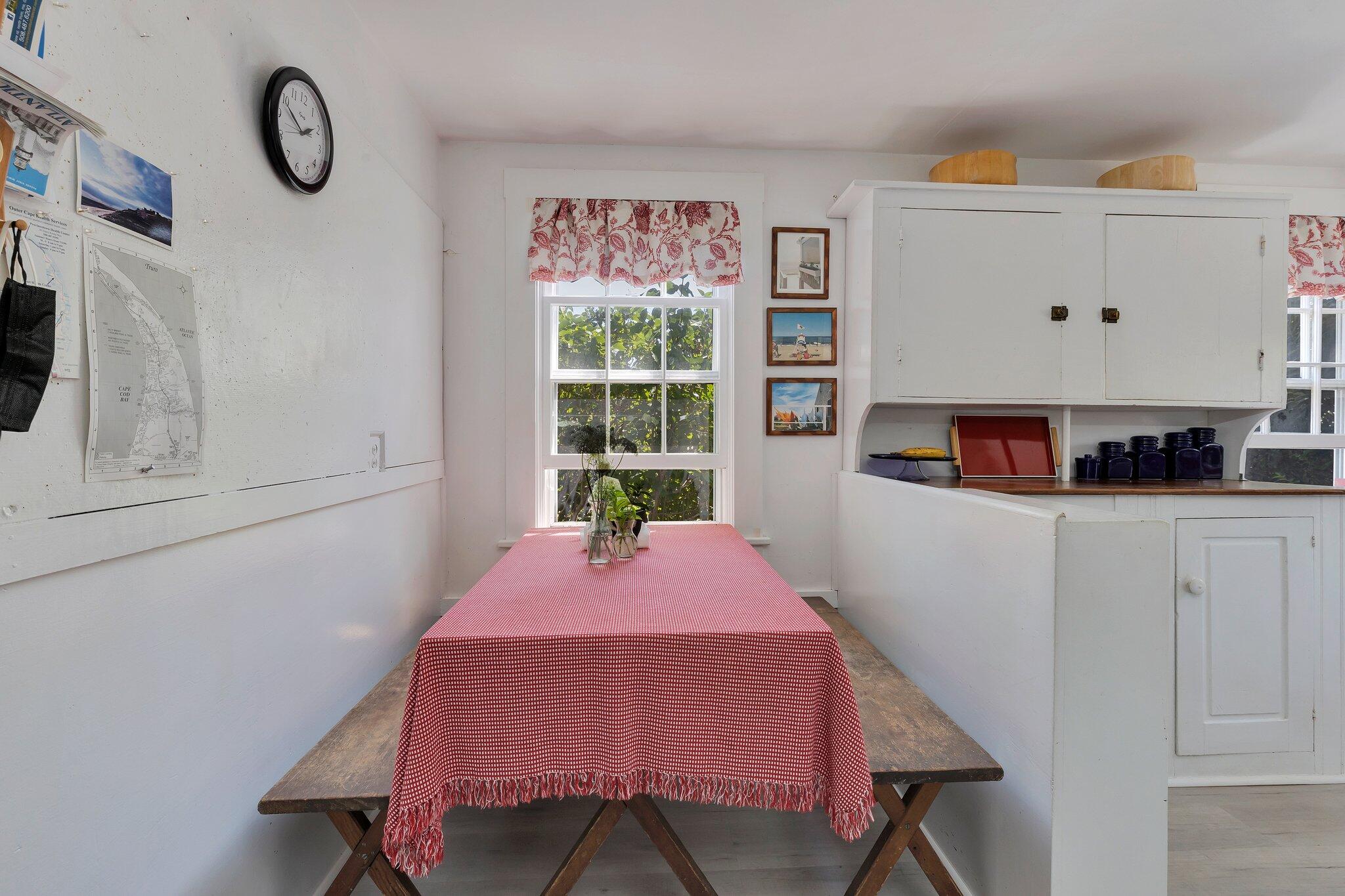 64 Depot Road Truro, MA 02666 - Photo 23 of 53 a bedroom with a bed and a window