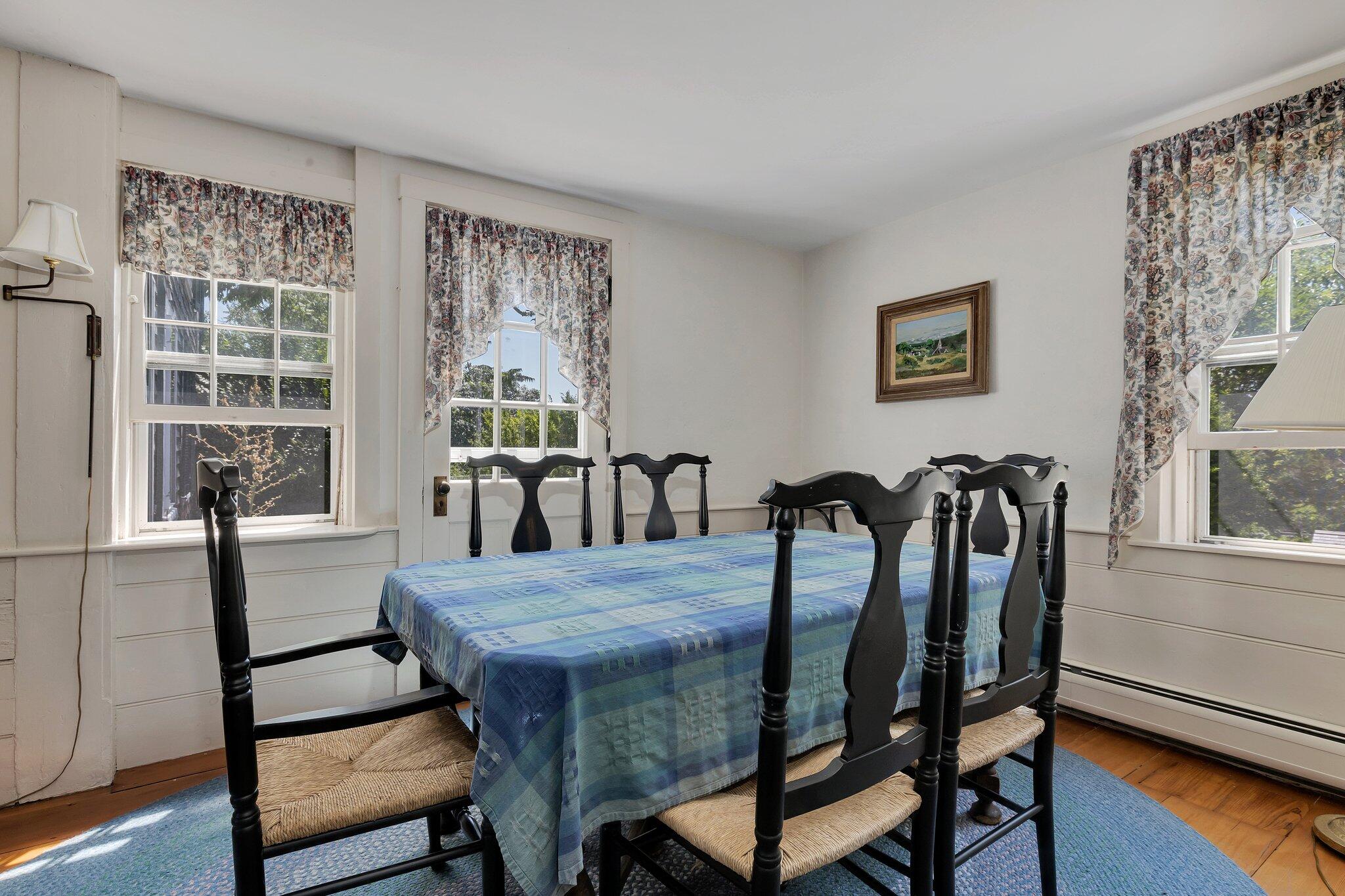 64 Depot Road Truro, MA 02666 - Photo 25 of 53 a view of a dining room with furniture window and wooden floor