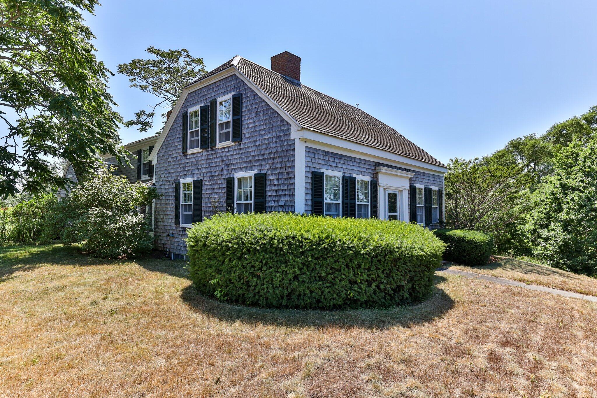 64 Depot Road Truro, MA 02666 - Photo 3 of 53 a front view of a house with garden