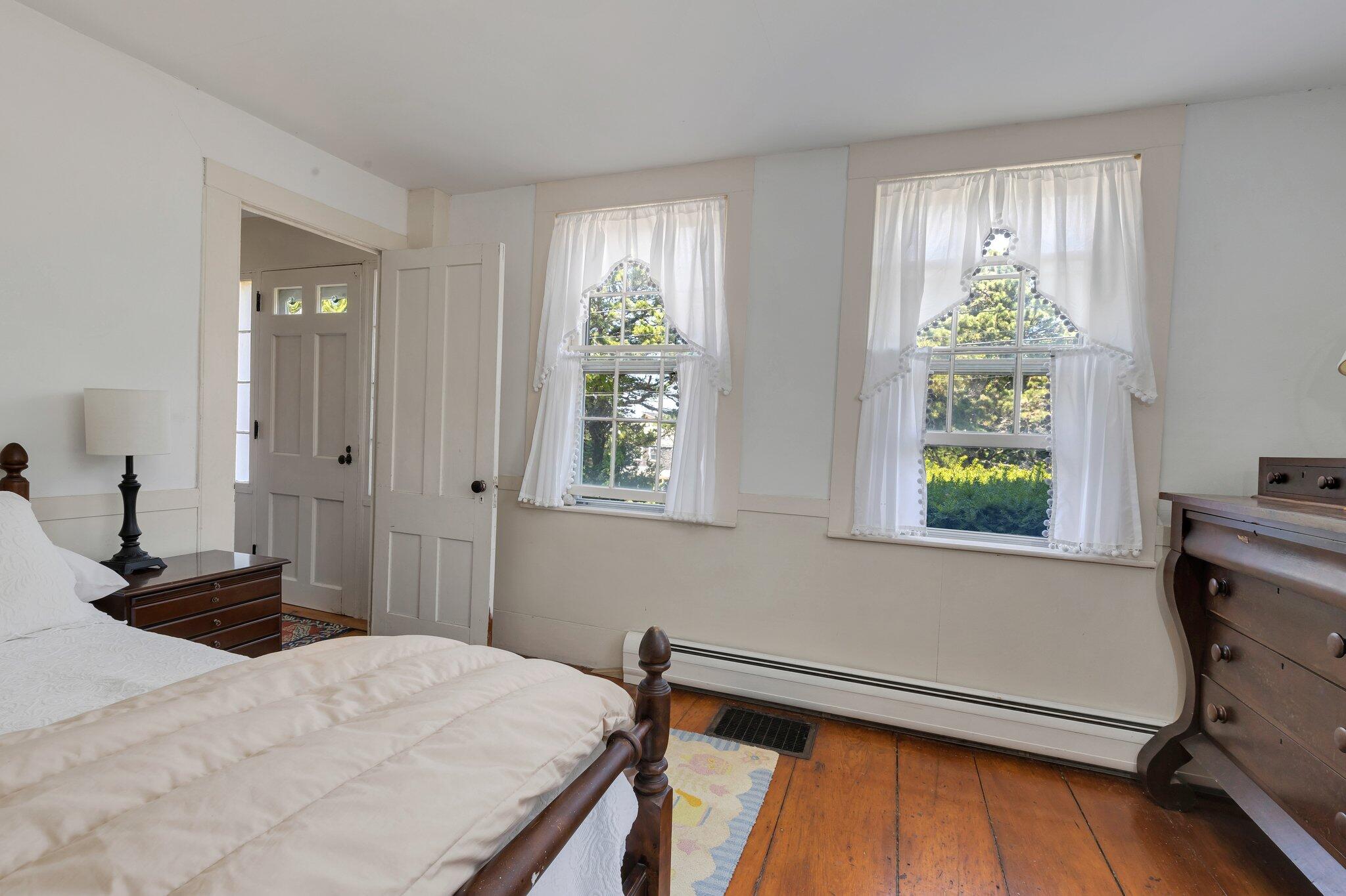 64 Depot Road Truro, MA 02666 - Photo 36 of 53 a bedroom with a bed and a window