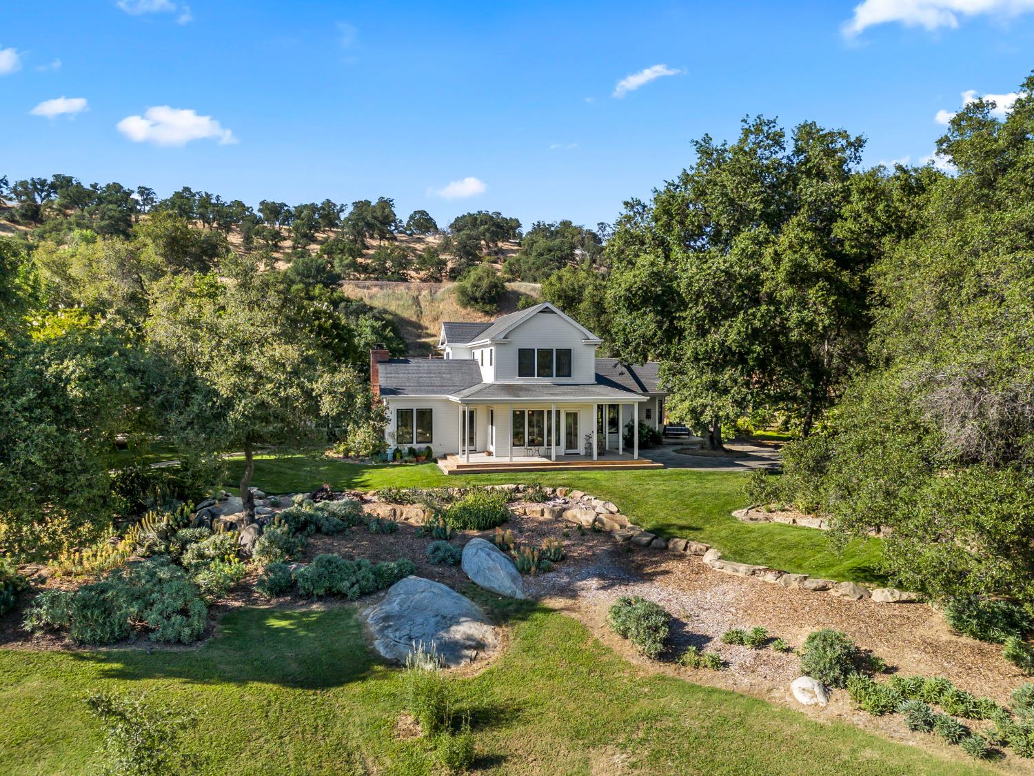 7407 Allen Lane Penryn, CA 95663 - Photo 1 of 83 a front view of a house with a yard and lake view
