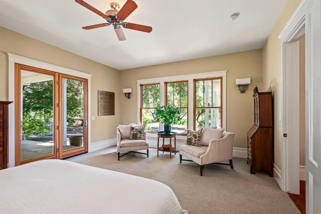 a view of an entryway with fireplace and a window