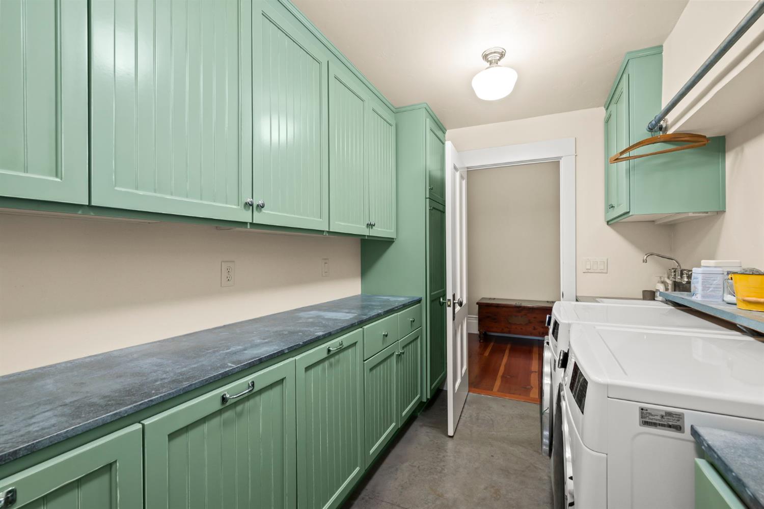 7407 Allen Lane Penryn, CA 95663 - Photo 30 of 83 a kitchen with a sink and cabinets