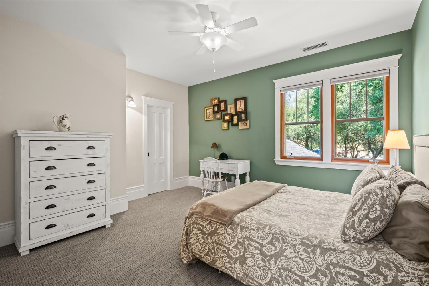 7407 Allen Lane Penryn, CA 95663 - Photo 51 of 83 a bedroom with a bed and a dresser with the potted plant