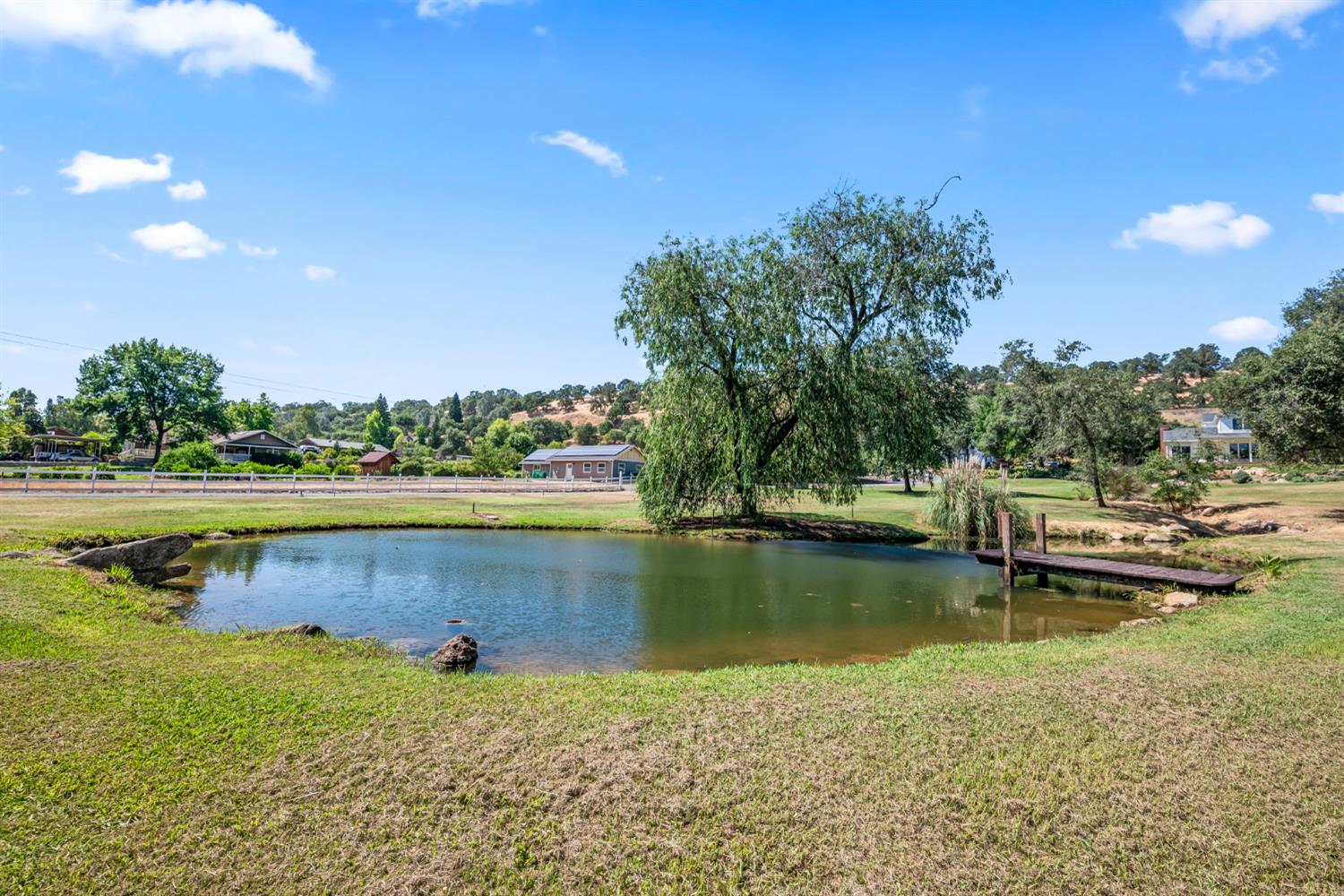 7407 Allen Lane Penryn, CA 95663 - Photo 64 of 83 a view of a lake with houses in the back