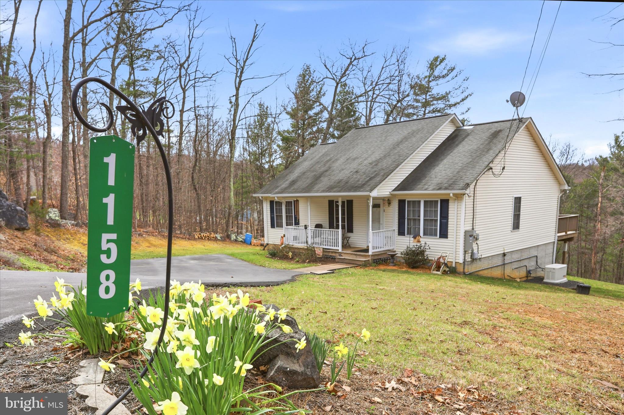 1158 Drummer Hill Road Front Royal, VA 22630 - Photo 1 of 36 a view of a house with swimming pool and sitting area