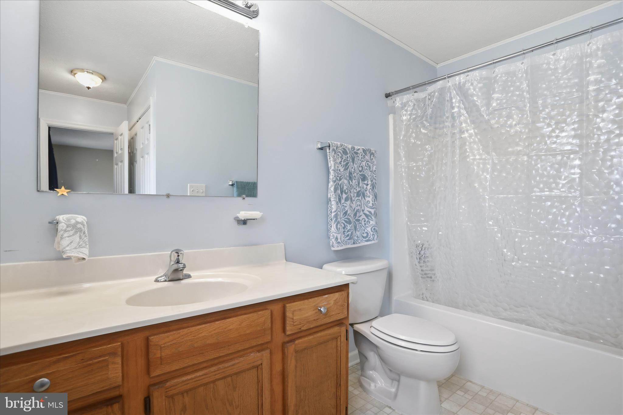 1158 Drummer Hill Road Front Royal, VA 22630 - Photo 16 of 36 a bathroom with a sink toilet and shower