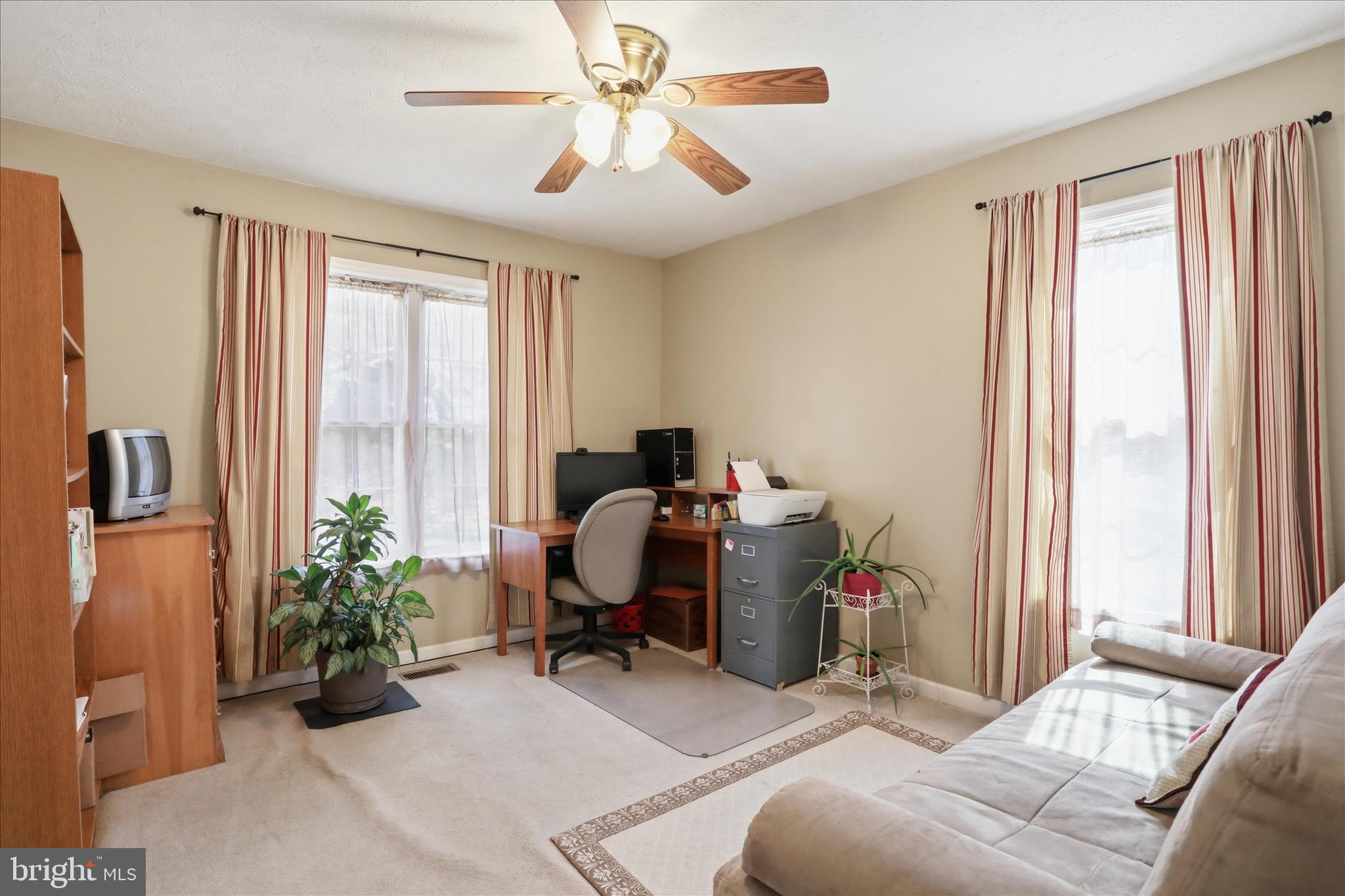 1158 Drummer Hill Road Front Royal, VA 22630 - Photo 19 of 36 a livingroom with workspace and a window