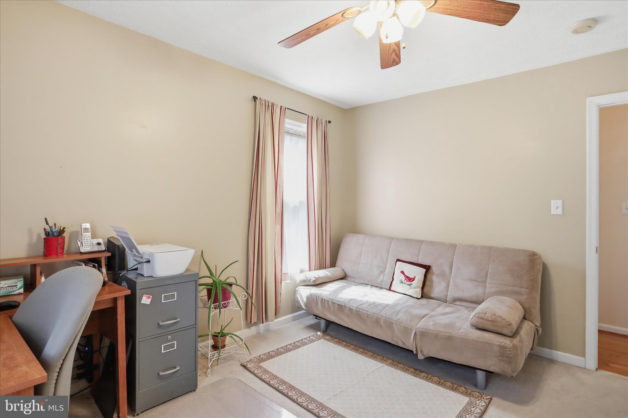 1158 Drummer Hill Road Front Royal, VA 22630 - Photo 21 of 36 a bedroom with a bed and a chandelier