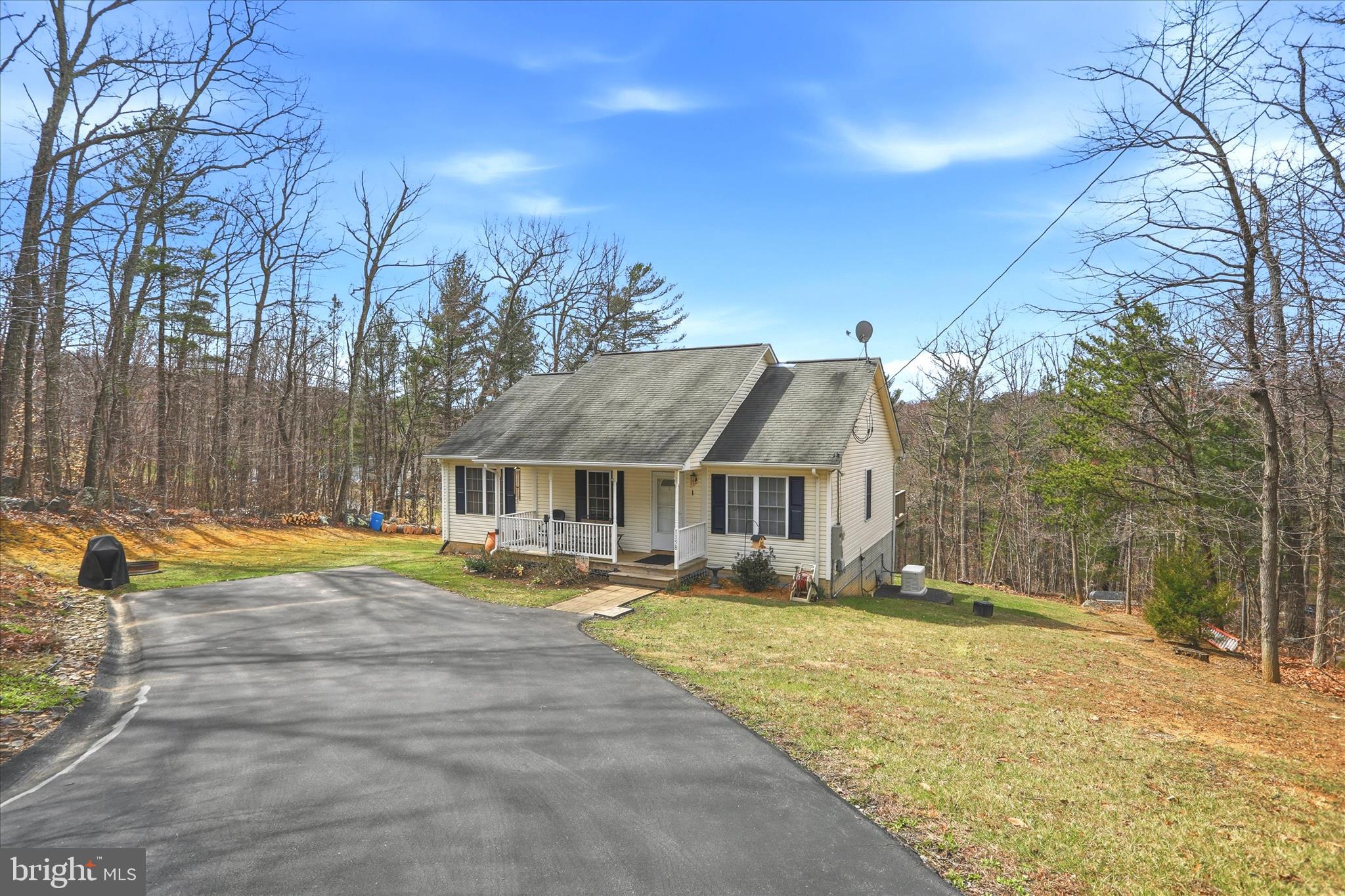 1158 Drummer Hill Road Front Royal, VA 22630 - Photo 29 of 36 a view of a house with snow on the side of the road