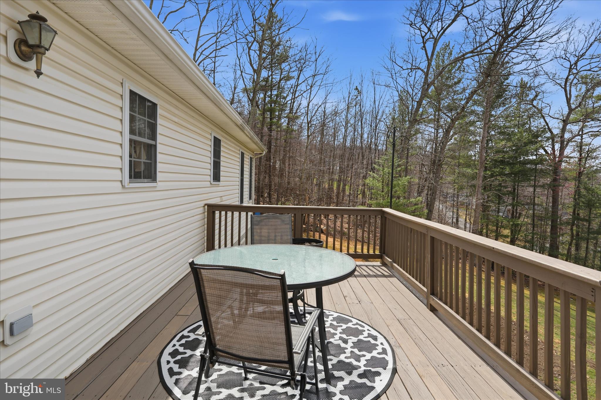 1158 Drummer Hill Road Front Royal, VA 22630 - Photo 30 of 36 a view of a balcony with furniture