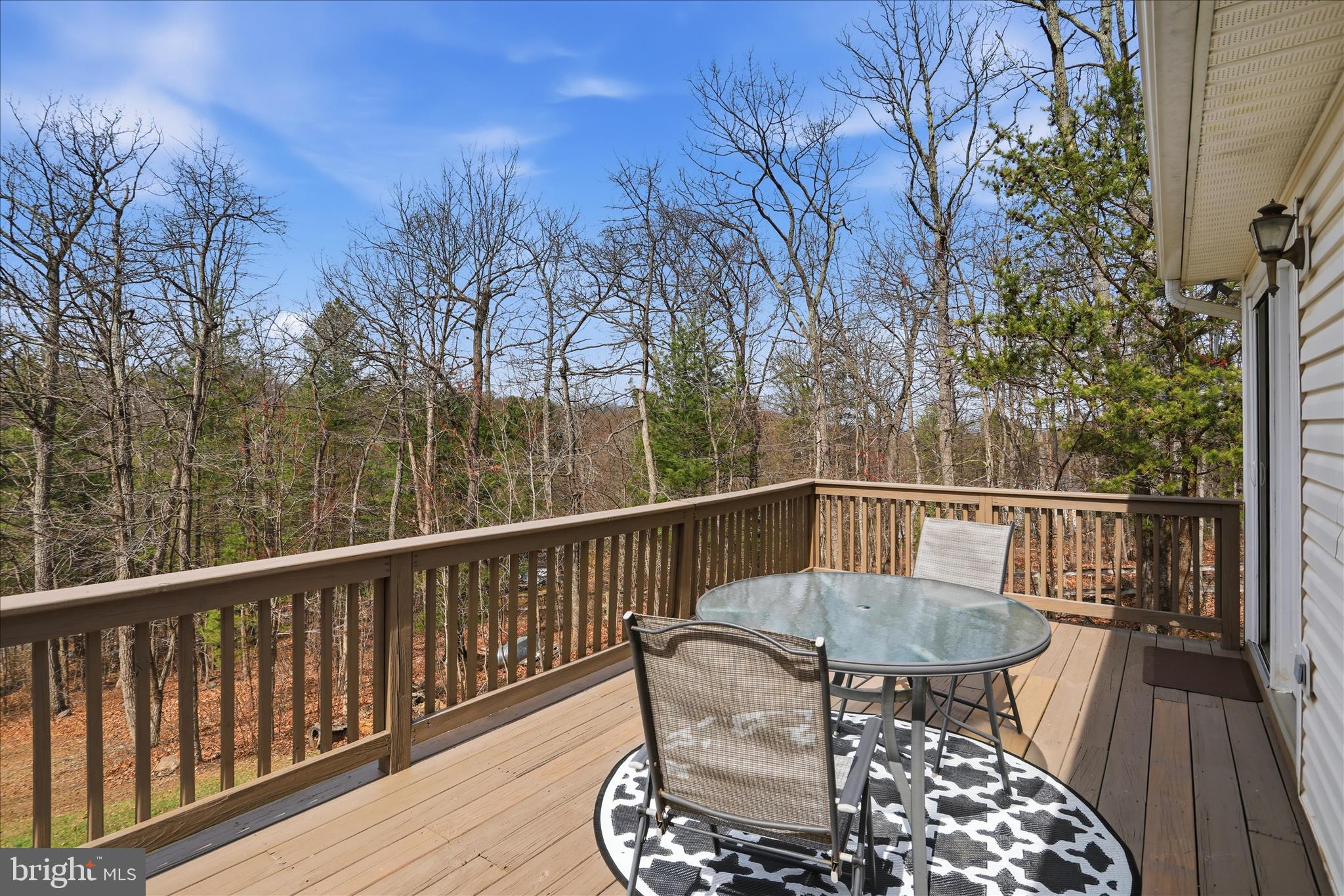1158 Drummer Hill Road Front Royal, VA 22630 - Photo 31 of 36 a view of balcony with furniture and wooden fence