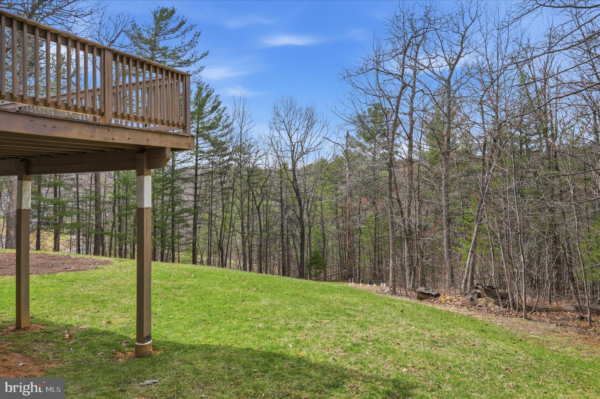 1158 Drummer Hill Road Front Royal, VA 22630 - Photo 33 of 36 a view of a house with backyard and porch