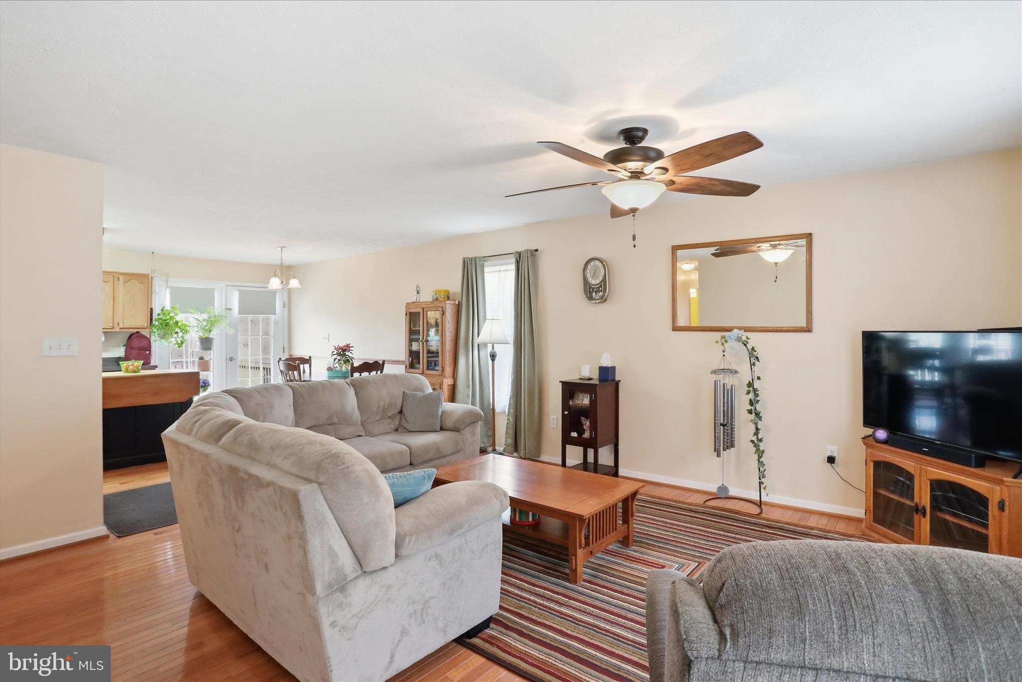1158 Drummer Hill Road Front Royal, VA 22630 - Photo 6 of 36 a living room with furniture and a flat screen tv