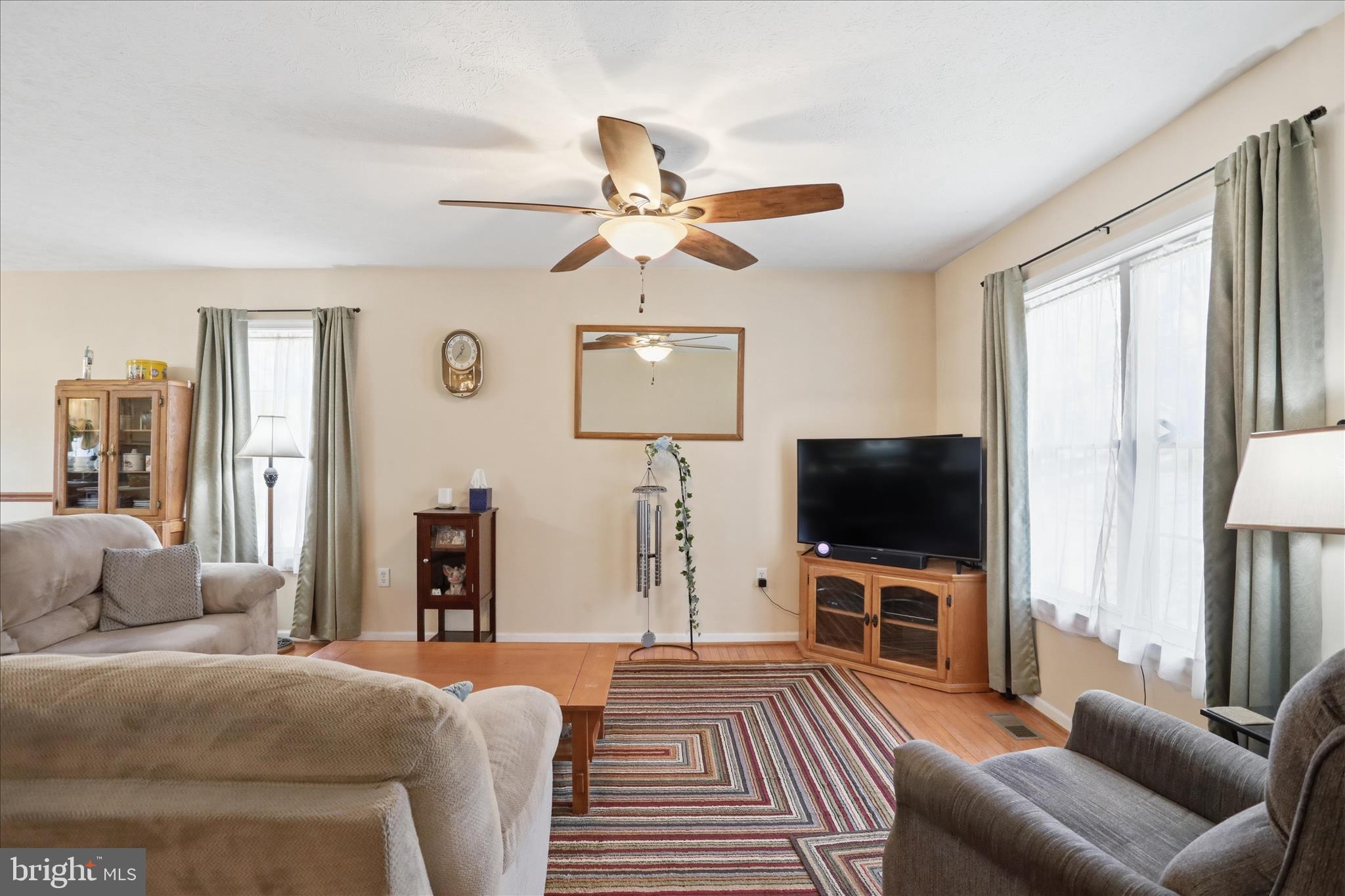 1158 Drummer Hill Road Front Royal, VA 22630 - Photo 7 of 36 a living room with furniture and a flat screen tv