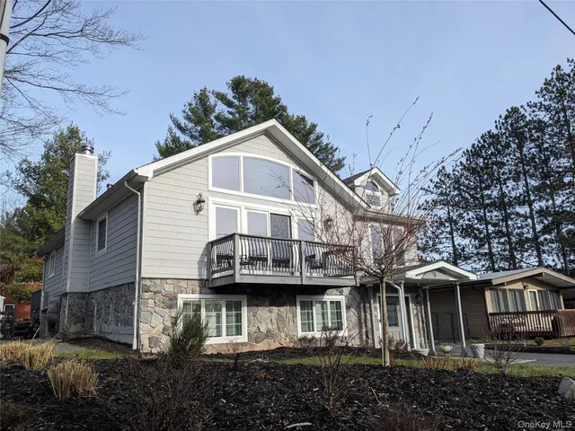a bed room with a bed and a window