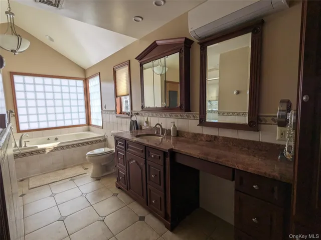 a bath tub sitting next to a window