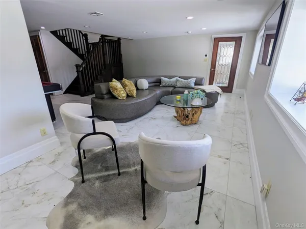 a bedroom with bed and window