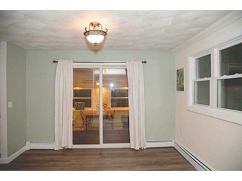 42 Anthony Road Foster, RI 02825 - Photo 9 of 25 Dining Room. Dining room leads to the enclosed sun porch.
