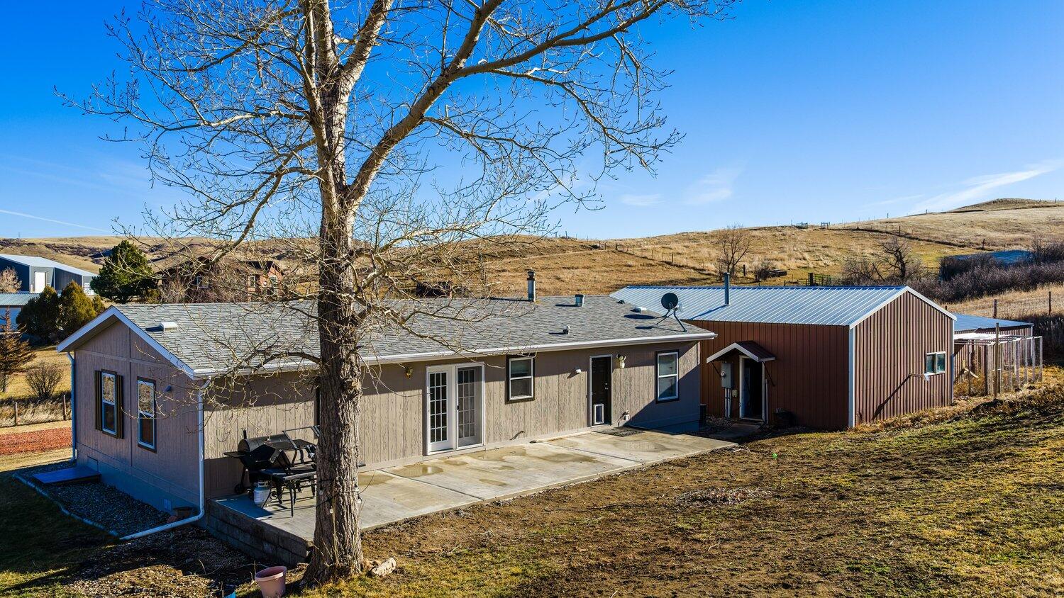 417 Meade Creek Road Sheridan, WY 82801 - Photo 12 of 40 Back Concrete Patio
