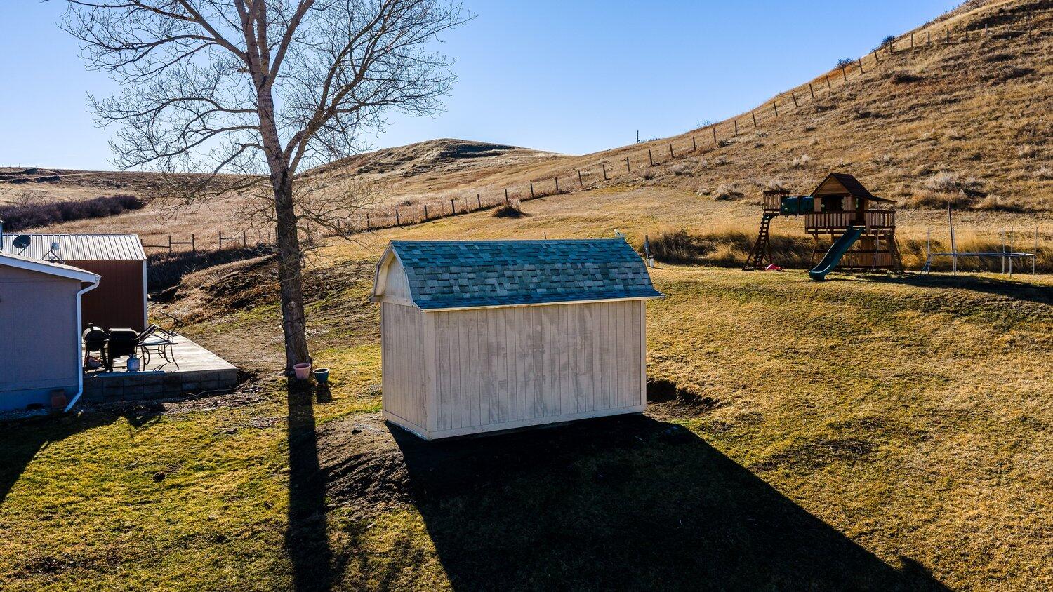 417 Meade Creek Road Sheridan, WY 82801 - Photo 36 of 40 Shed and Playset