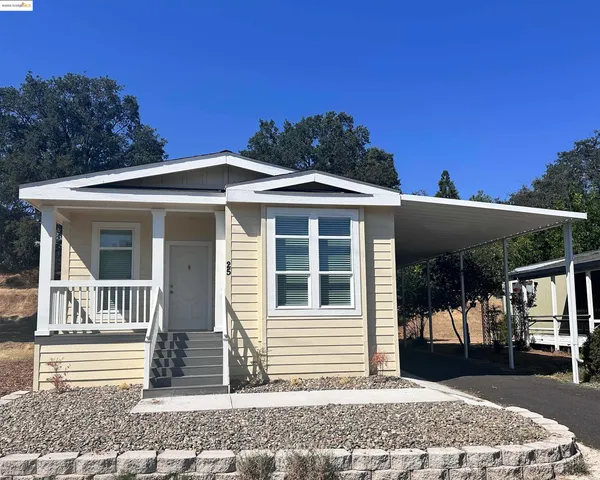 a kitchen with stainless steel appliances a sink stove and refrigerator