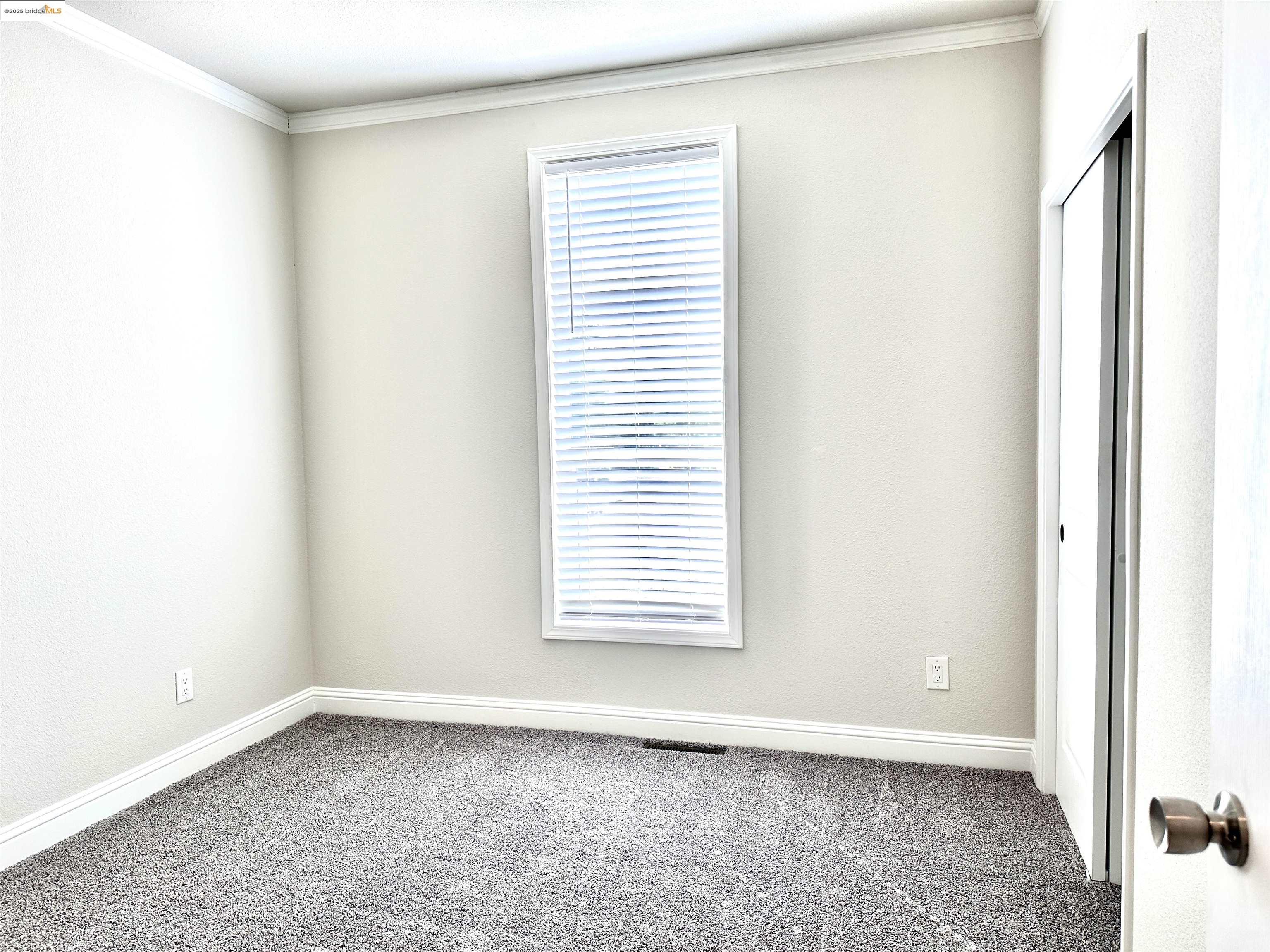 18330 Wards Ferry Road, Unit 25 Sonora, CA 95370 - Photo 17 of 22 a view of an empty room with a window
