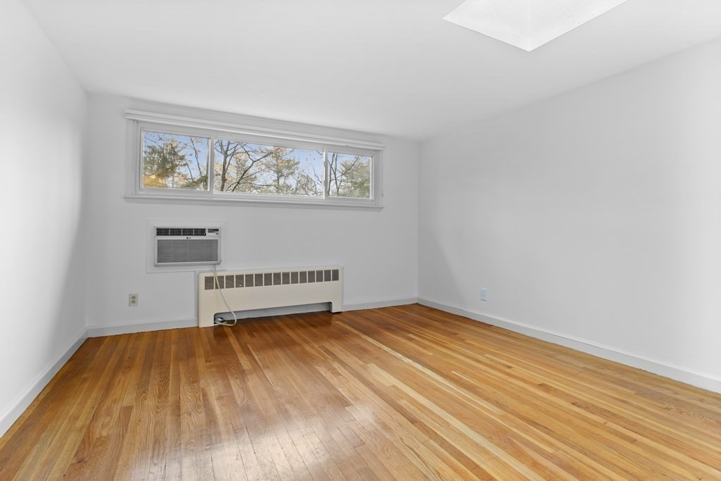 11 Patterson Road Lexington, MA 02421 - Photo 16 of 37 a view of a room with wooden floor and wall