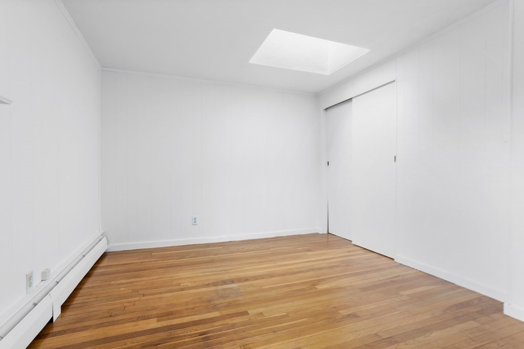 11 Patterson Road Lexington, MA 02421 - Photo 20 of 37 a view of empty room with wooden floor