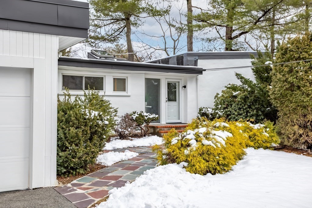 11 Patterson Road Lexington, MA 02421 - Photo 2 of 37 a view of a house with a flower garden