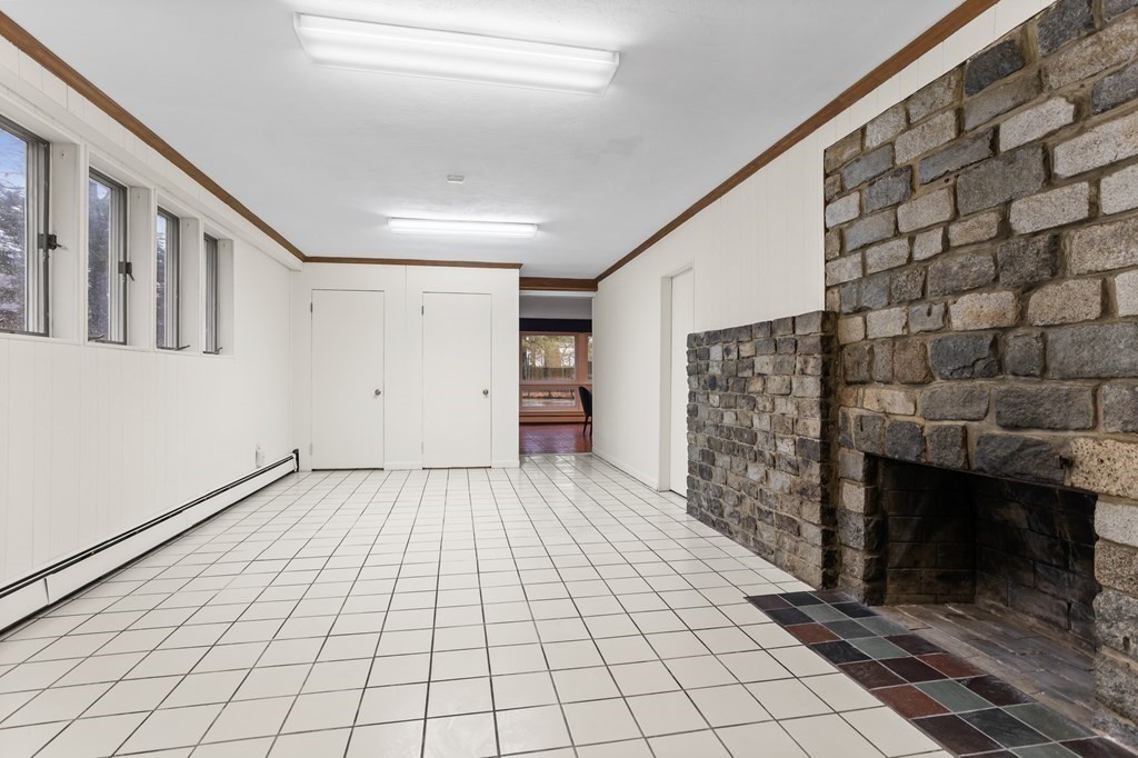 11 Patterson Road Lexington, MA 02421 - Photo 34 of 37 a view of an empty room and fire place