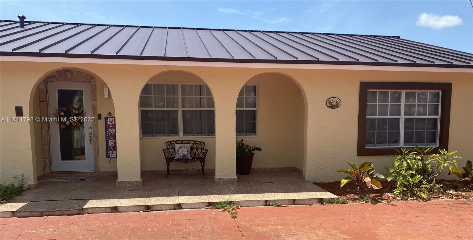 13360 Southwest 43rd Street Miami, FL 33175 - Photo 1 of 12 a front view of a house