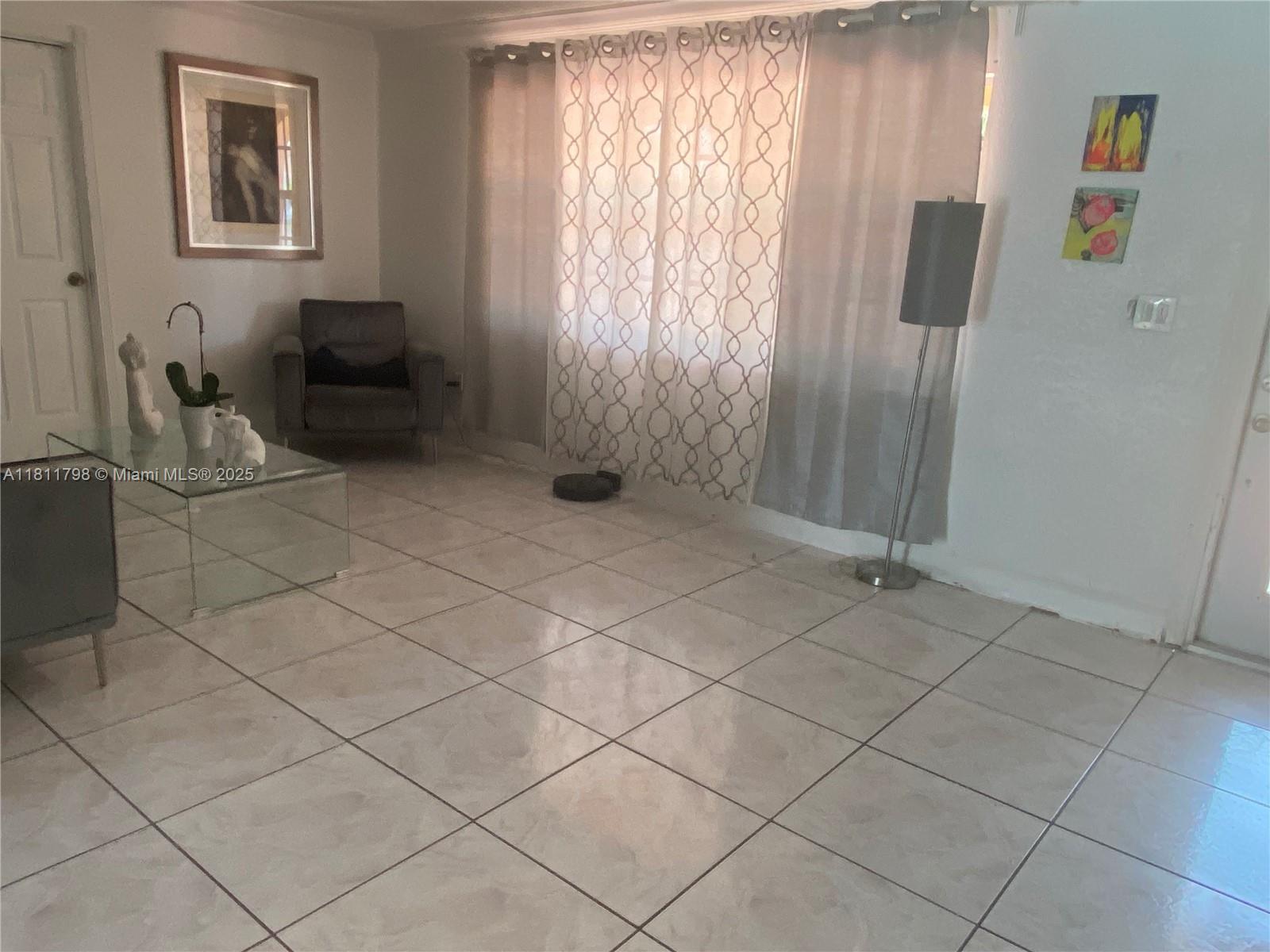 13360 Southwest 43rd Street Miami, FL 33175 - Photo 2 of 12 a bathroom with a sink and a shower